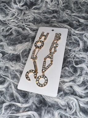 Bravo TV Network Bravoholic earrings dangle new merch form holiday collection